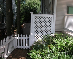 White Picket fence and Trash Enclosure